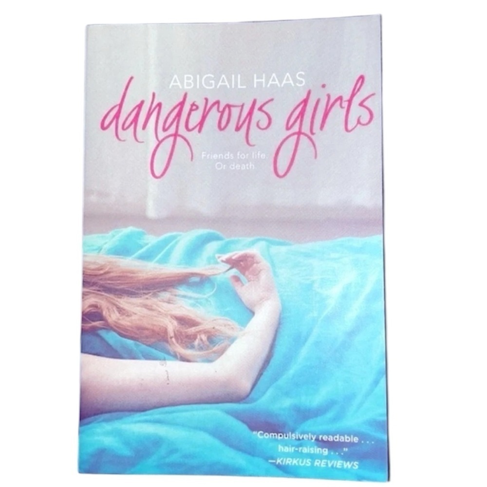 Dangerous Girls paperback book by Abigail Haas